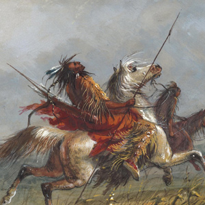 Two Indians on horseback, one leaning far back