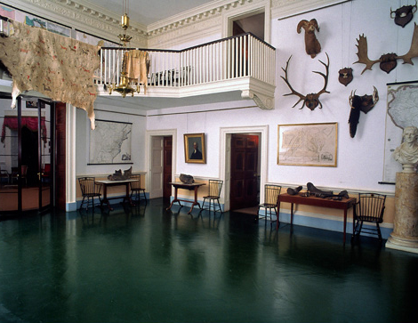 Indian Hall showing animal trophies and maps