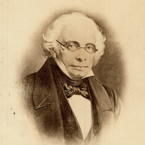 Portrait of an elderly Dehault Delassus wearing glasses