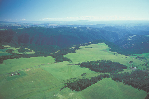 Lower Lolo Creek: a deep canyon with mountains and farmland above