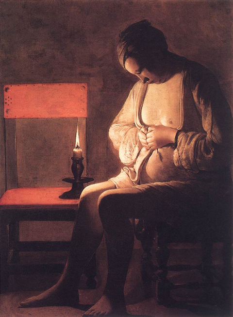 Woman crushing a flea between her fingernails