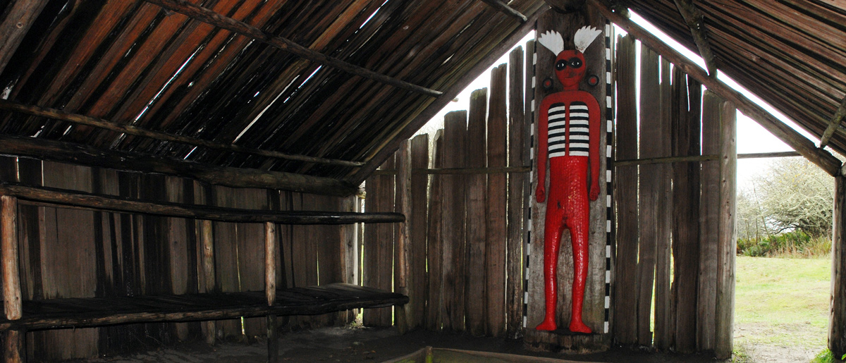 Tall statue of 'god' painted red