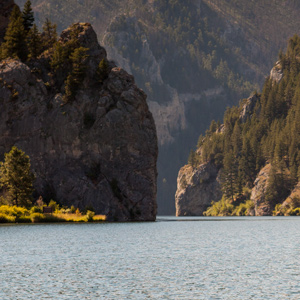 Cliffs rising above a blue river