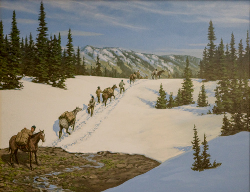 A line of horses cross a snow field