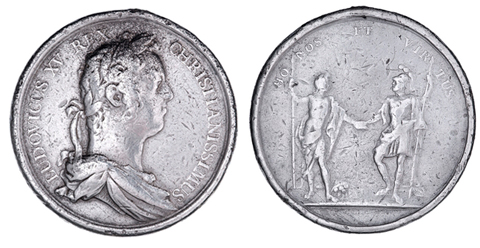 silver medal described below