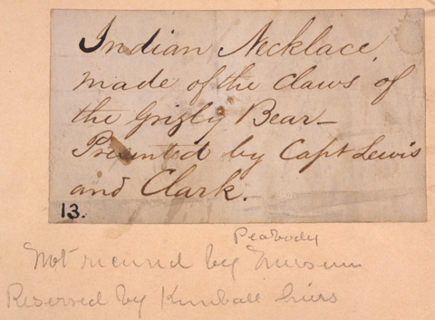 writing with a quill pen: 'Indian Necklace made of the claws of the Grizly Bear'