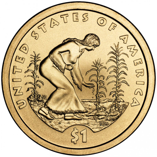 Gold-colored dollar coin with Indian woman planting corn