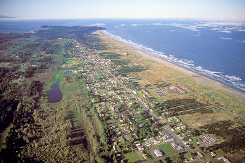 small town strung along the sandy ocean beach