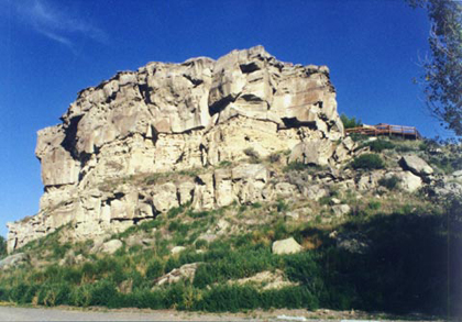 Large rock with white-cliff sides